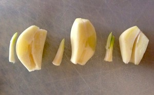 Garlic chopped in slices showing green bit
